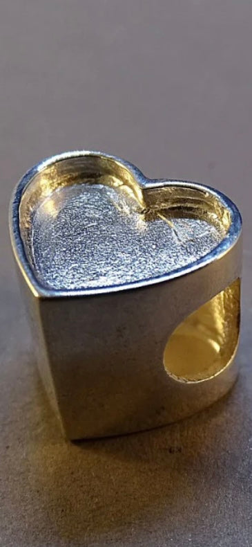 Silver heart charm