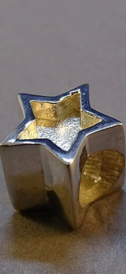 Silver star charm